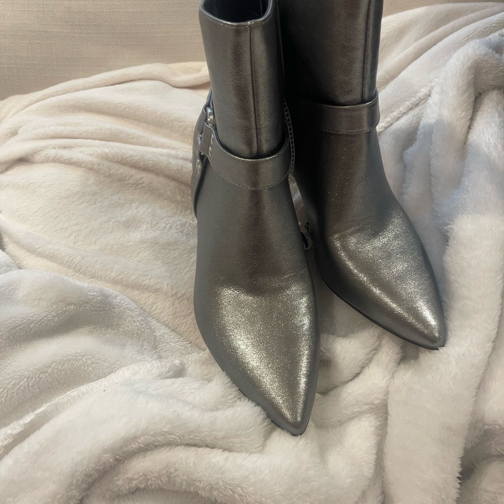 Jessica Simpson Silver Heeled Boots with Pointed Toe and Sleek Design